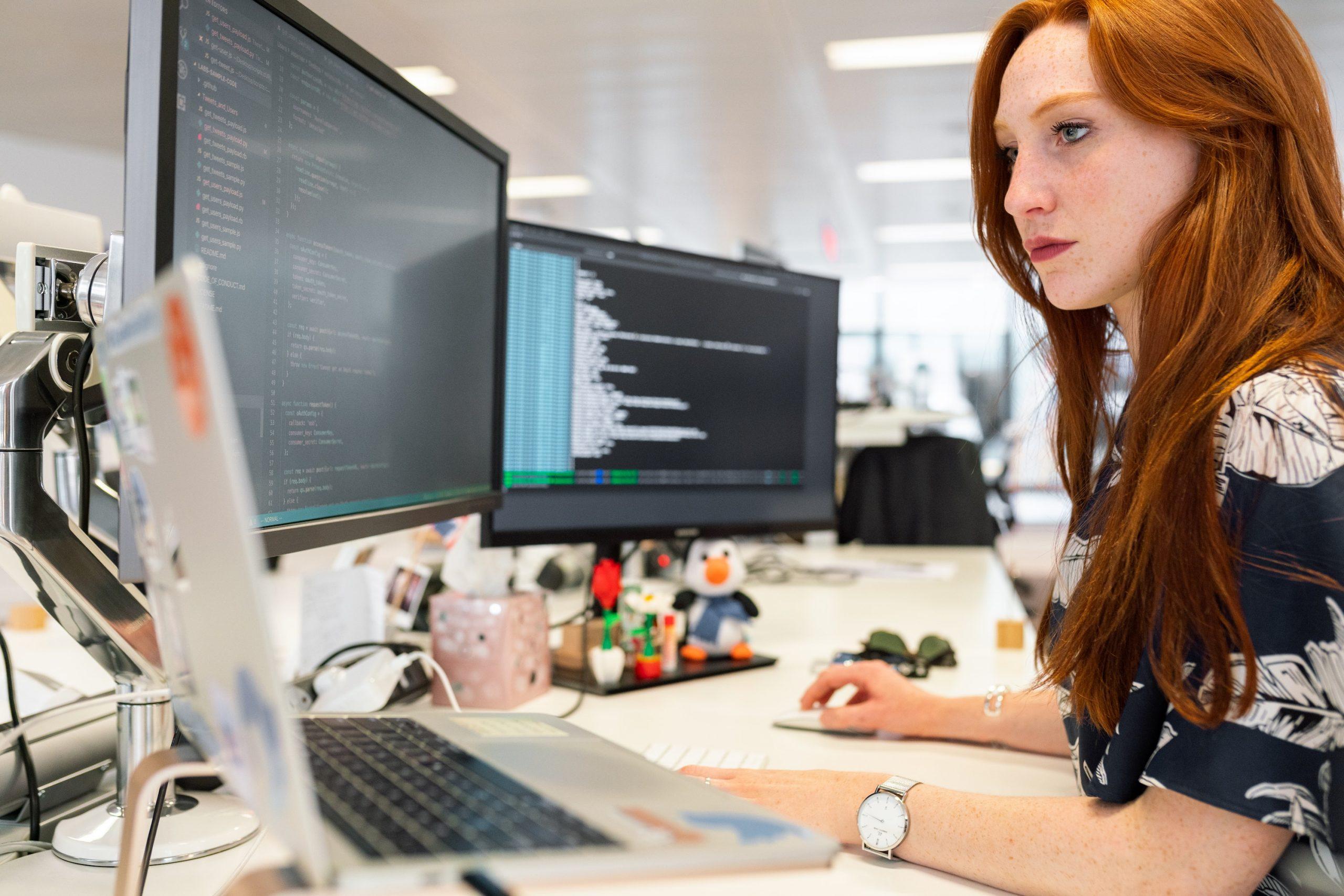 Woman using software development tools